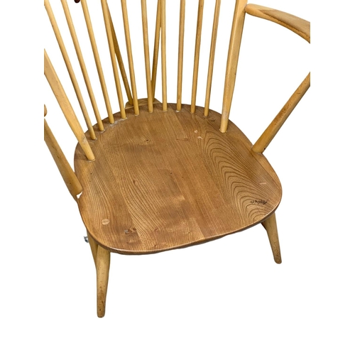 812 - An Ercol Blonde elm Grandfather armchair. Model 317. 74 x 59 x 95cm