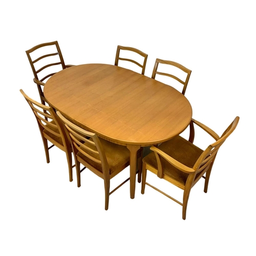 824 - A McIntosh teak Mid Century extending dining table and 6 chairs. Extended 205 x 98 x 76cm. Closed 15... 