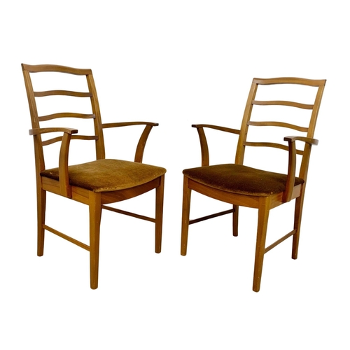 824 - A McIntosh teak Mid Century extending dining table and 6 chairs. Extended 205 x 98 x 76cm. Closed 15... 