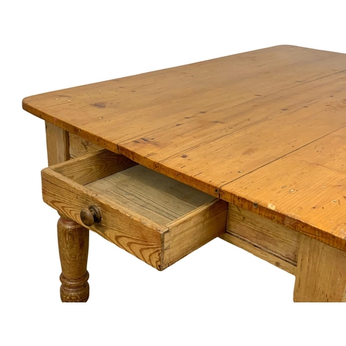 826 - A large Victorian pine farmhouse kitchen table with drawer. Circa 1880. 128 x 96 x 75cm