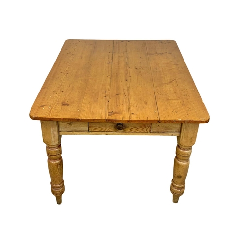 826 - A large Victorian pine farmhouse kitchen table with drawer. Circa 1880. 128 x 96 x 75cm