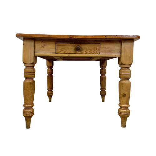 826 - A large Victorian pine farmhouse kitchen table with drawer. Circa 1880. 128 x 96 x 75cm