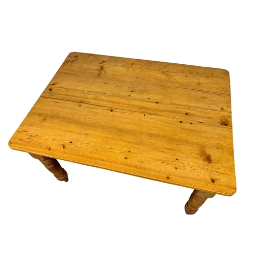 826 - A large Victorian pine farmhouse kitchen table with drawer. Circa 1880. 128 x 96 x 75cm