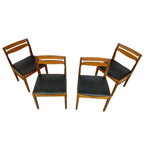 829 - A set of 4 Nathan teak chairs with black vinyl seats. Mid Century.