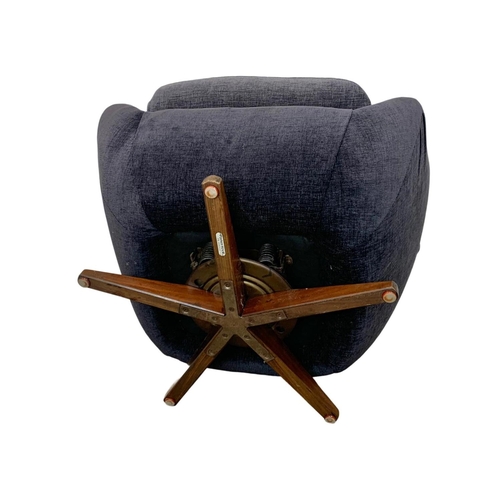 831 - A vintage Parker Knoll “Statesman” swivel chair. Mid Century. 1960’s.