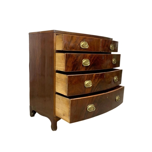 832 - A Georgian brass inlaid mahogany bow front chest of drawers. Circa 1820. 90 x 50 x 90.5cm