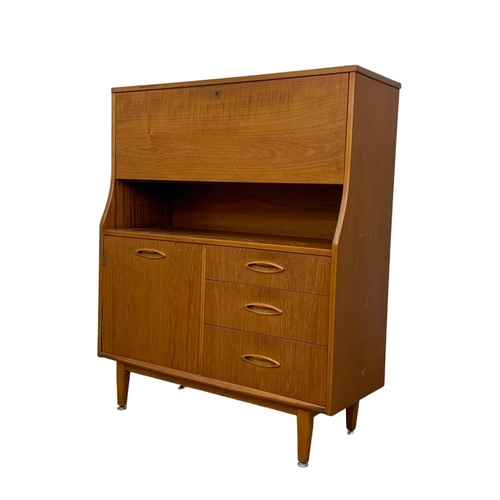 833 - A teak secretaire bureau by Jentique. Mid Century. 1960’s. 91 x 35.5 x 110cm