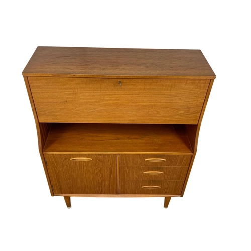 833 - A teak secretaire bureau by Jentique. Mid Century. 1960’s. 91 x 35.5 x 110cm