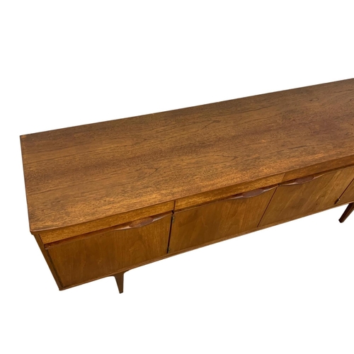 834 - An Austinsuite teak Mid Century sideboard with 4 drawers. Circa 1960’s. 199 x 48 x 79cm.