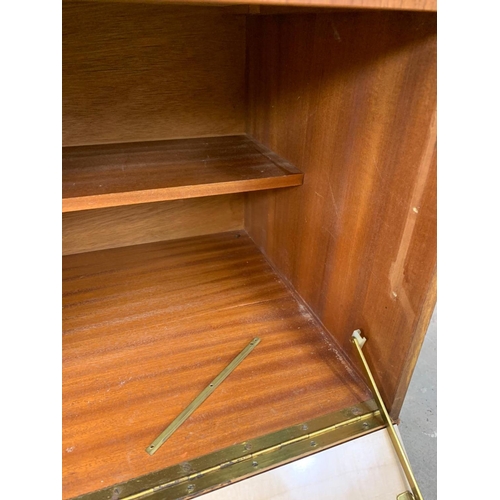 834 - An Austinsuite teak Mid Century sideboard with 4 drawers. Circa 1960’s. 199 x 48 x 79cm.