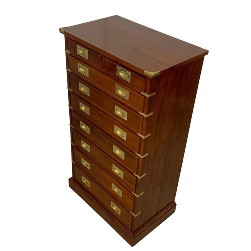 839 - A tall Campaign Military style mahogany brass bound chest of drawers. 74.5 x 45.5 x 132cm.