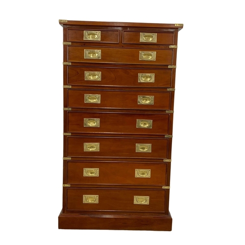 839 - A tall Campaign Military style mahogany brass bound chest of drawers. 74.5 x 45.5 x 132cm.