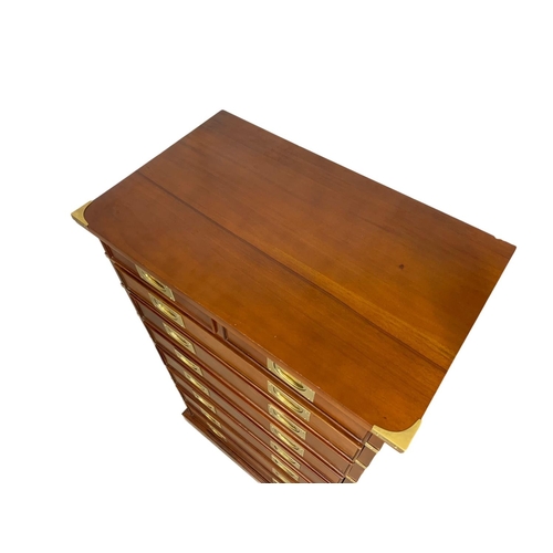 839 - A tall Campaign Military style mahogany brass bound chest of drawers. 74.5 x 45.5 x 132cm.