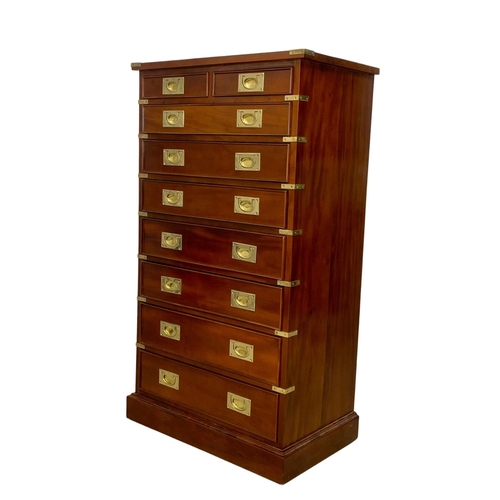 839 - A tall Campaign Military style mahogany brass bound chest of drawers. 74.5 x 45.5 x 132cm.