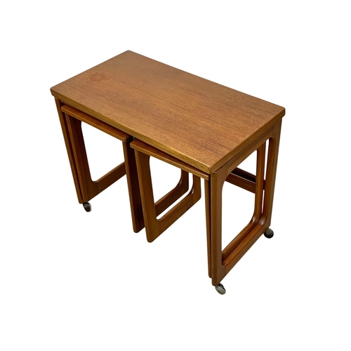 843 - A McIntosh teak “Triform” fold over coffee nest of tables. Mid Century. 74 x 40.5 x 60.5cm