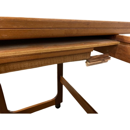 843 - A McIntosh teak “Triform” fold over coffee nest of tables. Mid Century. 74 x 40.5 x 60.5cm