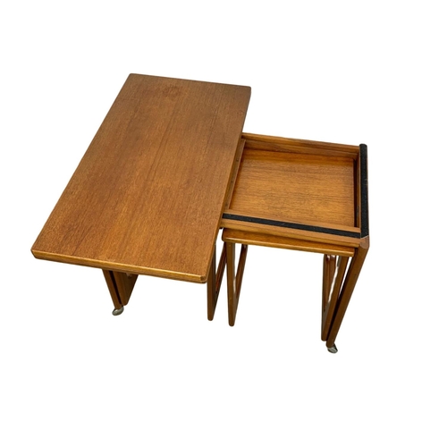 843 - A McIntosh teak “Triform” fold over coffee nest of tables. Mid Century. 74 x 40.5 x 60.5cm