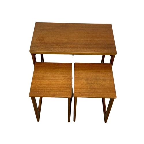 843 - A McIntosh teak “Triform” fold over coffee nest of tables. Mid Century. 74 x 40.5 x 60.5cm