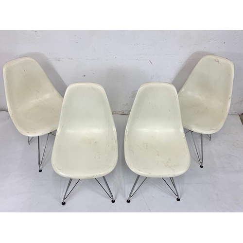 846 - A set of 4 vintage Charles & Ray Eames style Model DSR chairs. Circa 1980.