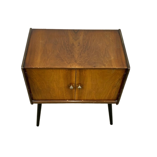 847 - A 1960’s Mid Century tola wood record cabinet by Homeworthy. 61 x 36.5 x 70.5cm