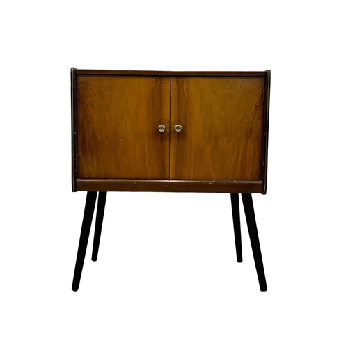 847 - A 1960’s Mid Century tola wood record cabinet by Homeworthy. 61 x 36.5 x 70.5cm