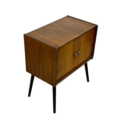 847 - A 1960’s Mid Century tola wood record cabinet by Homeworthy. 61 x 36.5 x 70.5cm