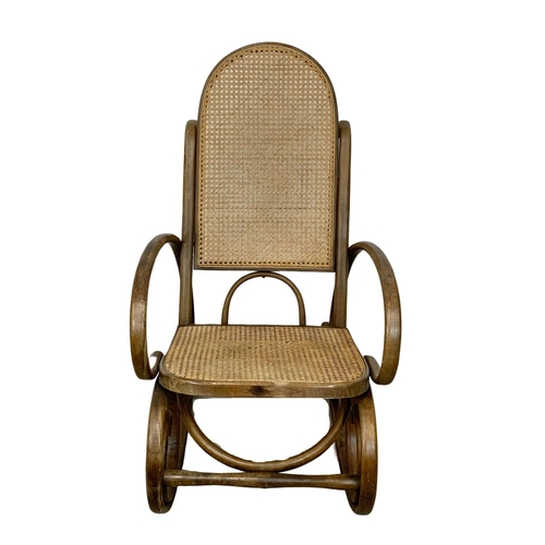 861 - A vintage Bentwood rocking chair with bergere back and seat 49.5 x 92 x 99cm.