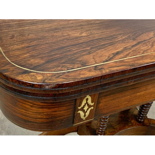 869 - A Regency brass inlaid rosewood turnover games table. Circa 1820. 93.5 x 46 x 77cm