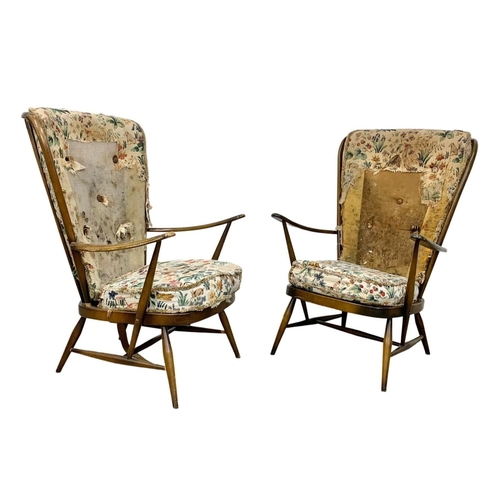 917 - A pair of Ercol model 478 high back armchairs. Mid Century.