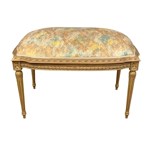 927 - A large 18th century style French footstool. 82 x 52 x 56cm