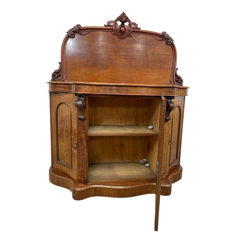 944 - A Victorian 3 door mahogany chiffonier. Circa 1860. 138 x 50 x 158.5cm.