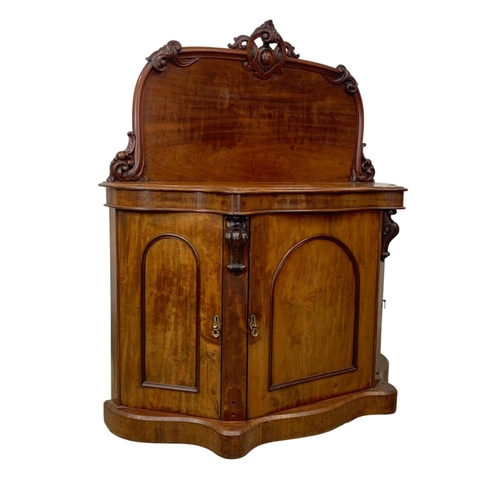 944 - A Victorian 3 door mahogany chiffonier. Circa 1860. 138 x 50 x 158.5cm.