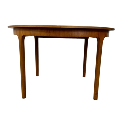 966 - A McIntosh teak Mid Century extending dining table. Extended 167.5 x 122 x 74cm. Closed 122cm