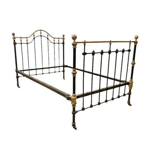 988 - A Victorian brass and iron double bed. 124 x 198cm