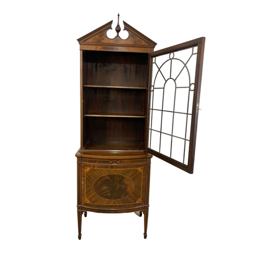 993 - A vintage inlaid mahogany display cabinet in the Sheraton and Federal style. 66 x 40 x 199cm.