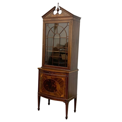 993 - A vintage inlaid mahogany display cabinet in the Sheraton and Federal style. 66 x 40 x 199cm.