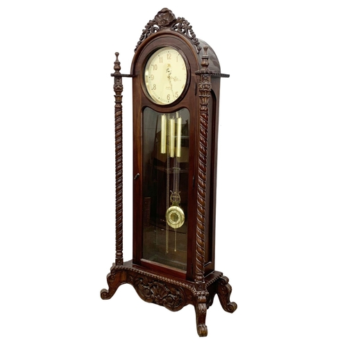 995 - A large ornate carved mahogany German long case clock by Junghans. With weights and pendulum. 85 x 4... 