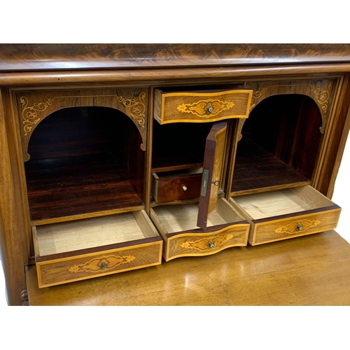 1078 - A large 19th century continental mahogany escritoire with rosewood and satinwood interior. Circa 187... 