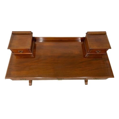 1082 - A late Victorian mahogany dressing table top with a later base. 122 x 54 x 96.5cm