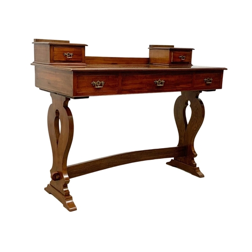 1082 - A late Victorian mahogany dressing table top with a later base. 122 x 54 x 96.5cm