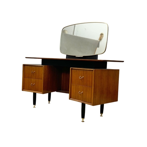 881 - A G-Plan Librenza tola dressing table with stool. Mid Century. 1950’s. 151.5 x 60 x 129cm.