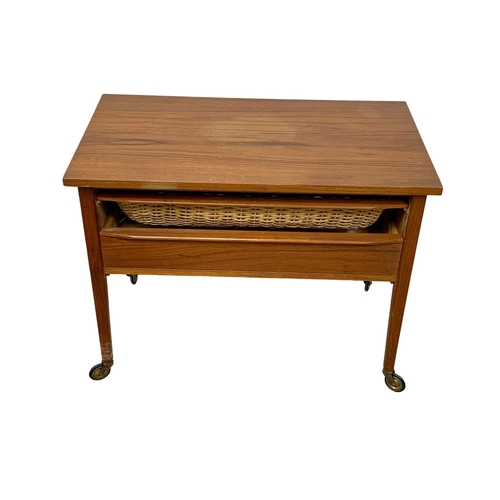 889 - A Danish teak sewing table with 2 drawers. Mid Century. Denmark. 1960. 68 x 39 x 54cm