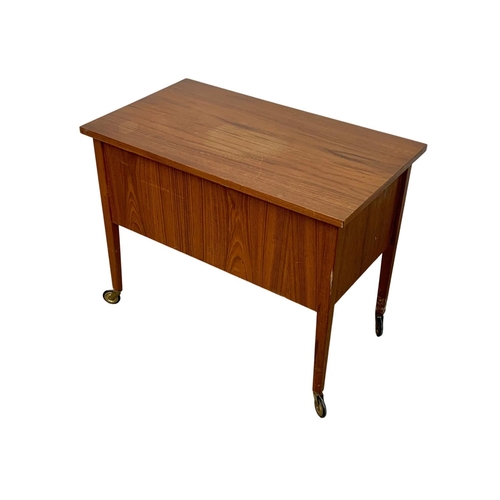 889 - A Danish teak sewing table with 2 drawers. Mid Century. Denmark. 1960. 68 x 39 x 54cm