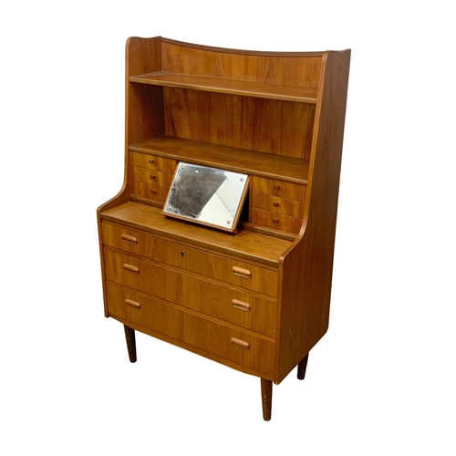 906 - A Danish teak Mid Century vanity unit with 9 drawers and foldaway mirror. Denmark 1960’s. 83.5 x 43 ... 