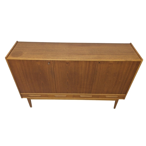 907 - A Danish teak Mid Century high sideboard with 4 drawers. Mid Century Denmark. 1960. 170 x 44 x 110cm... 