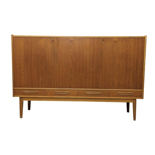 907 - A Danish teak Mid Century high sideboard with 4 drawers. Mid Century Denmark. 1960. 170 x 44 x 110cm... 