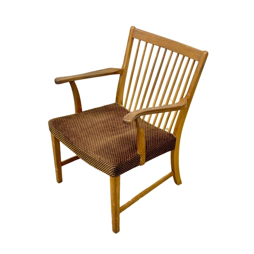 915e - A Danish oak Mid Century lounge armchair. 59 x 77 x 78.5cm.