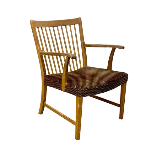 915e - A Danish oak Mid Century lounge armchair. 59 x 77 x 78.5cm.