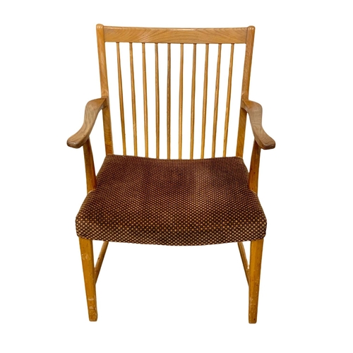 915e - A Danish oak Mid Century lounge armchair. 59 x 77 x 78.5cm.