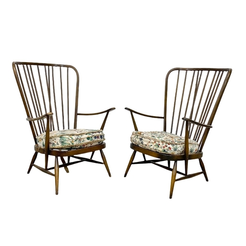 917 - A pair of Ercol model 478 high back armchairs. Mid Century.